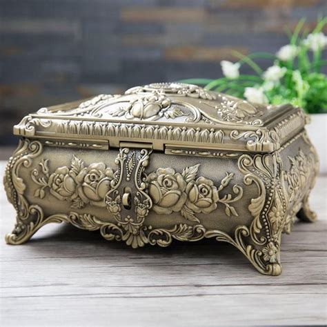 metal piece outside jewelry box|antique metal jewelry box.